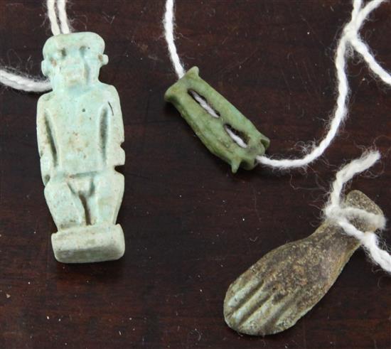 Three Egyptian turquoise glazed faience amulets, 1.5-3.2cm